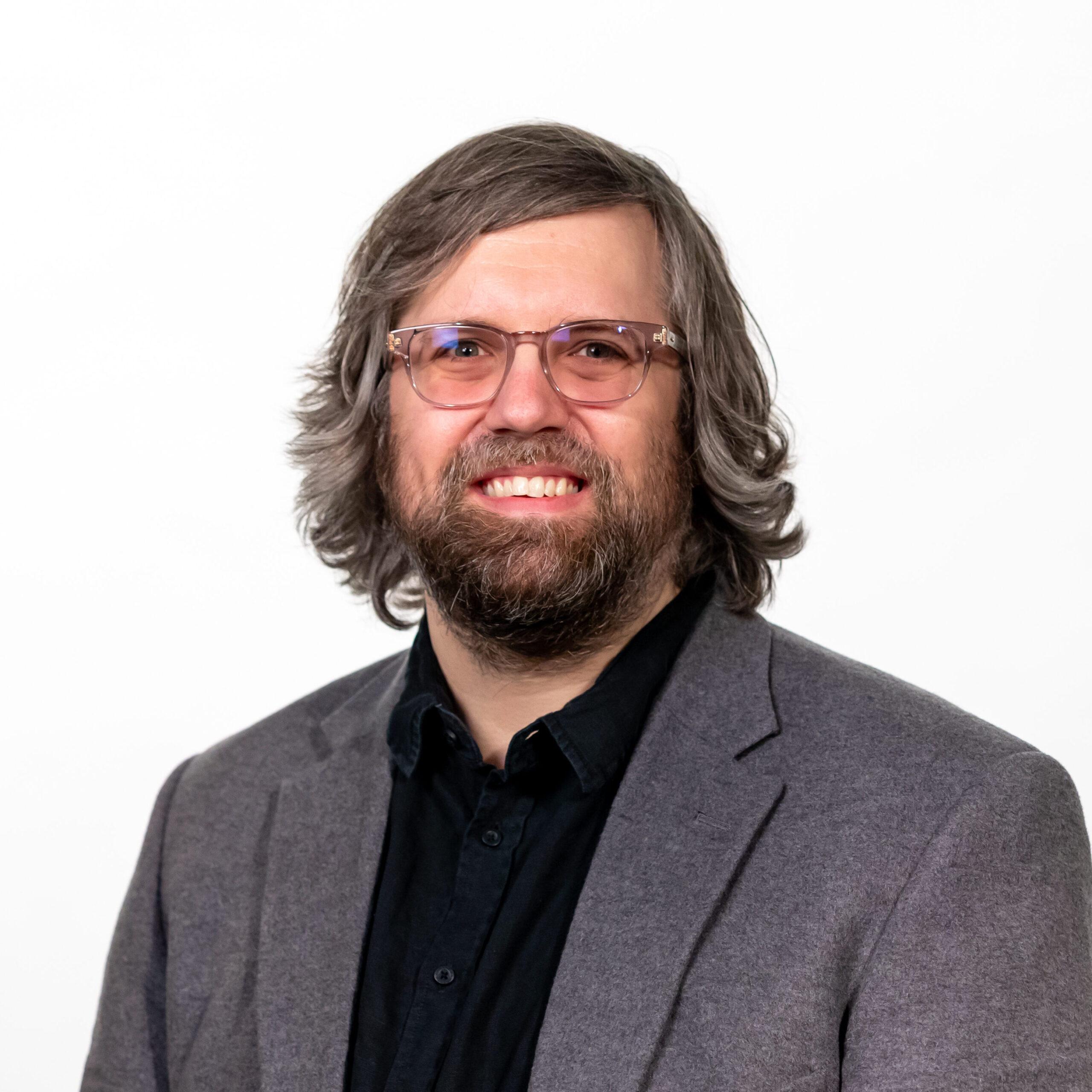 Headshot of Richard (Rick) Skarbez against a white background.